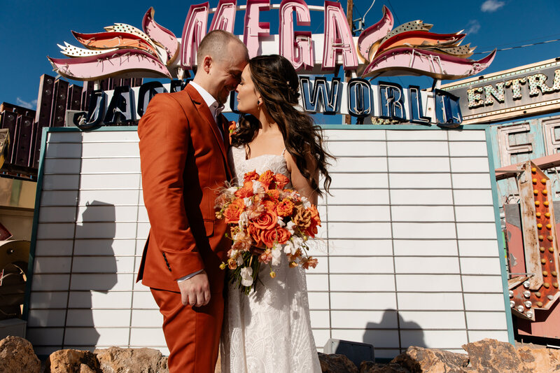 A bride and groom at their Neon Museum Wedding