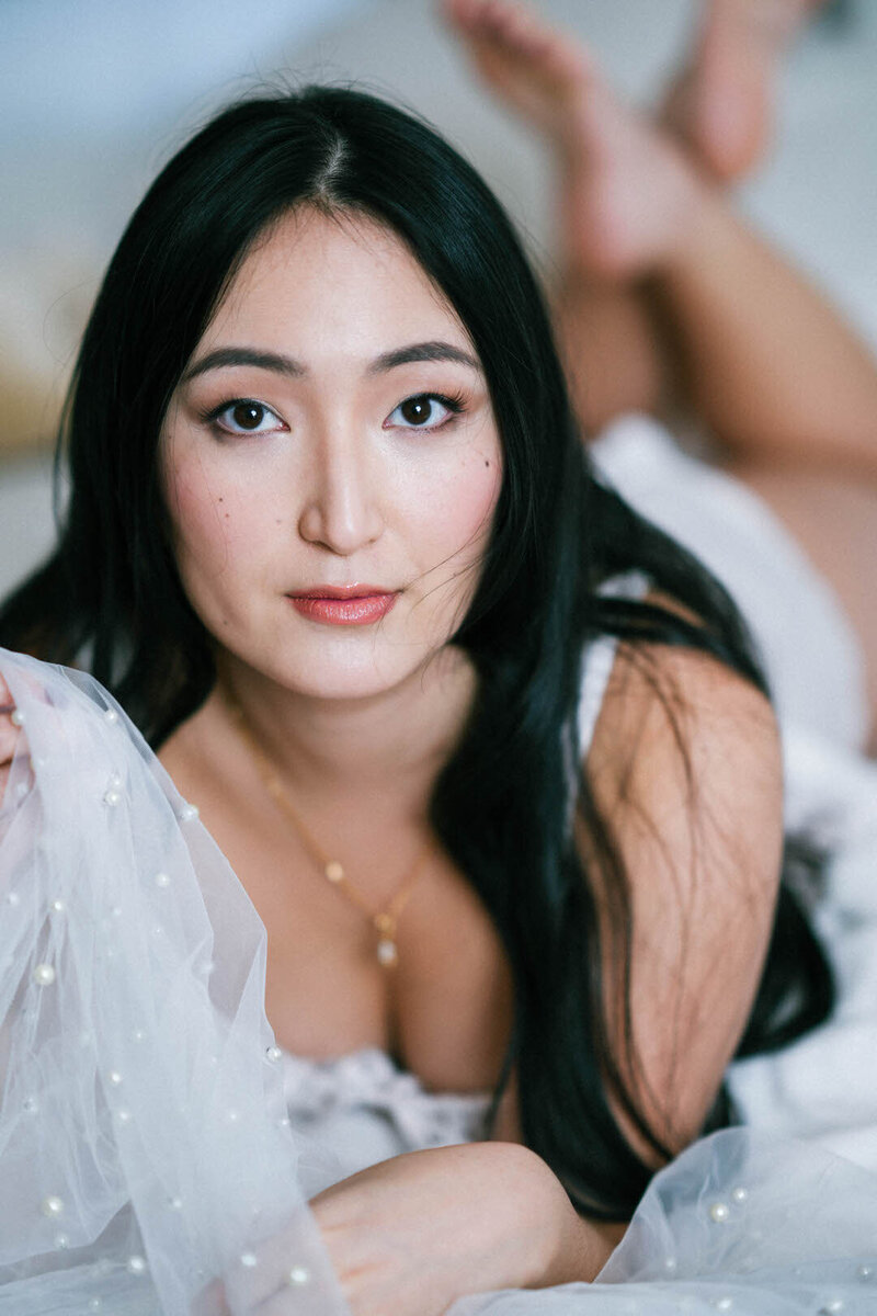 Close up photo of client during boudoir session