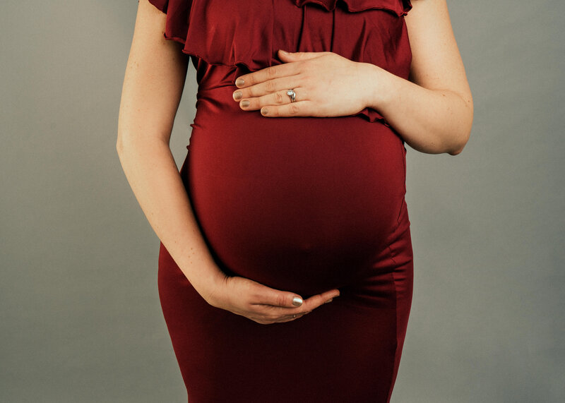 maternity-model-posing-with-image-of-bump
