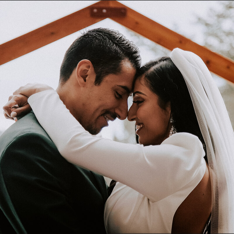 couple shown sharing their first dance as a married couple on their wedding day in banff