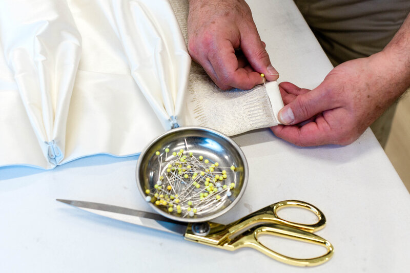 atelier worker manufacturing drapery