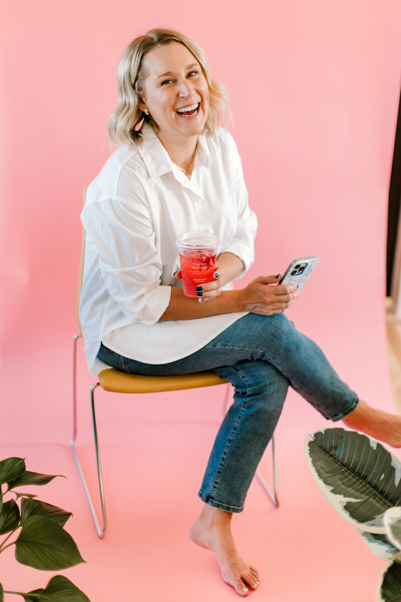 Sarah Kaetterhenry drinking coffee out of joy cup at home