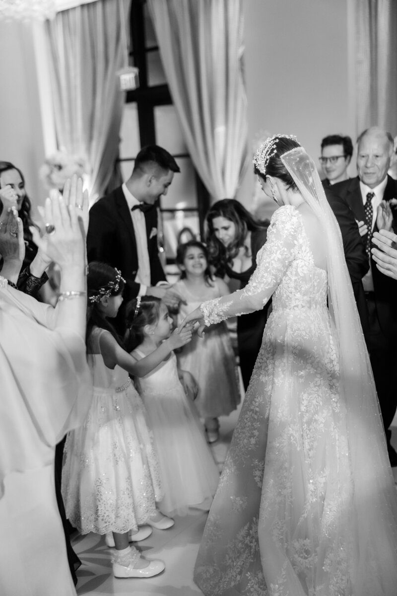 Bride and groom at their wedding reception at the four seasons Orlando by Florida wedding photographer.