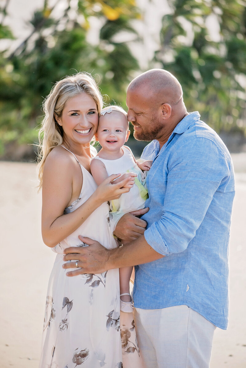 Family enjoying a beach photo session in Maui