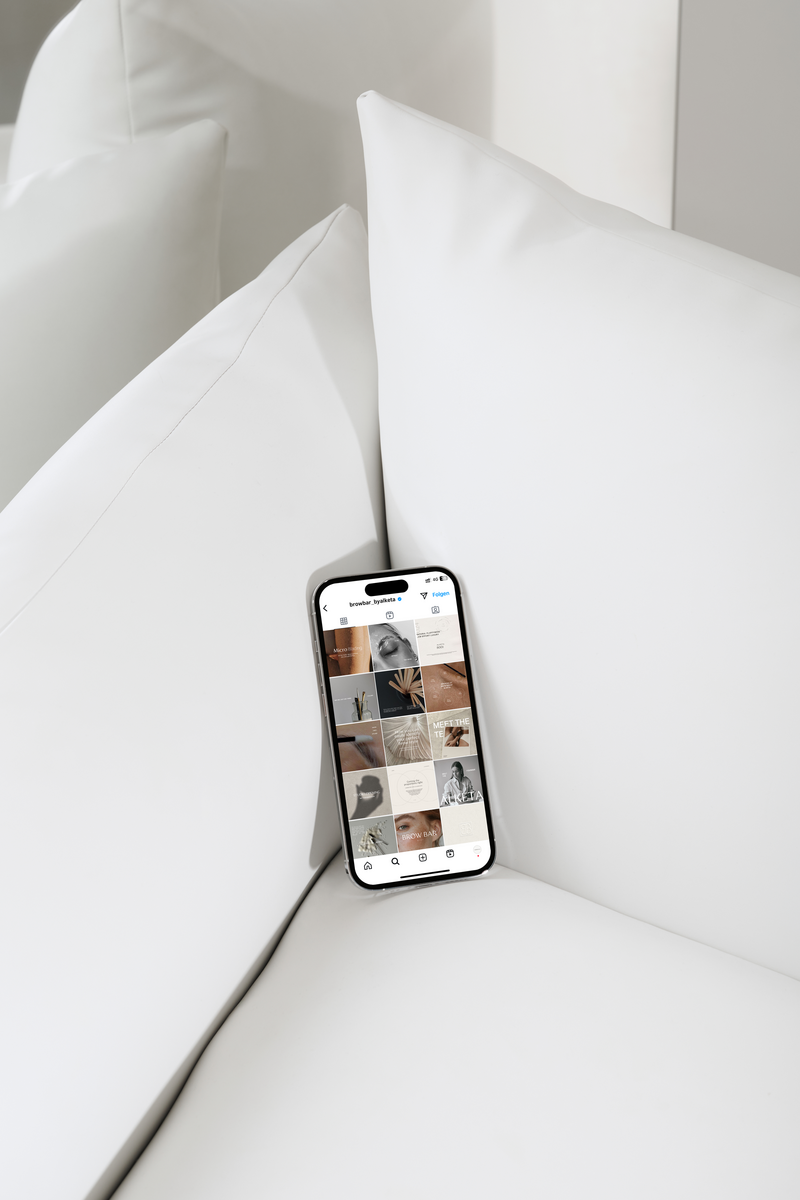 mockup iPhone on white Sofa Brow Bar Instagram Feed Design