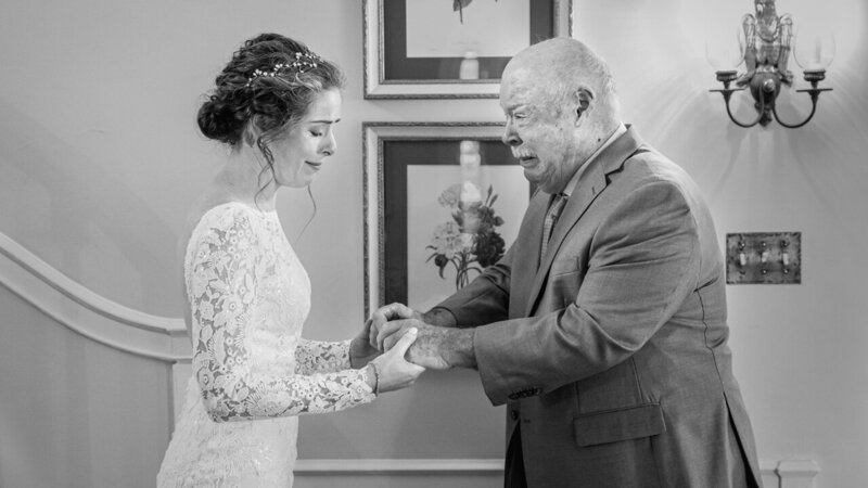 Bride and her dad crying with raw emotion during their first look, a powerful and unscripted moment captured in PJ style.