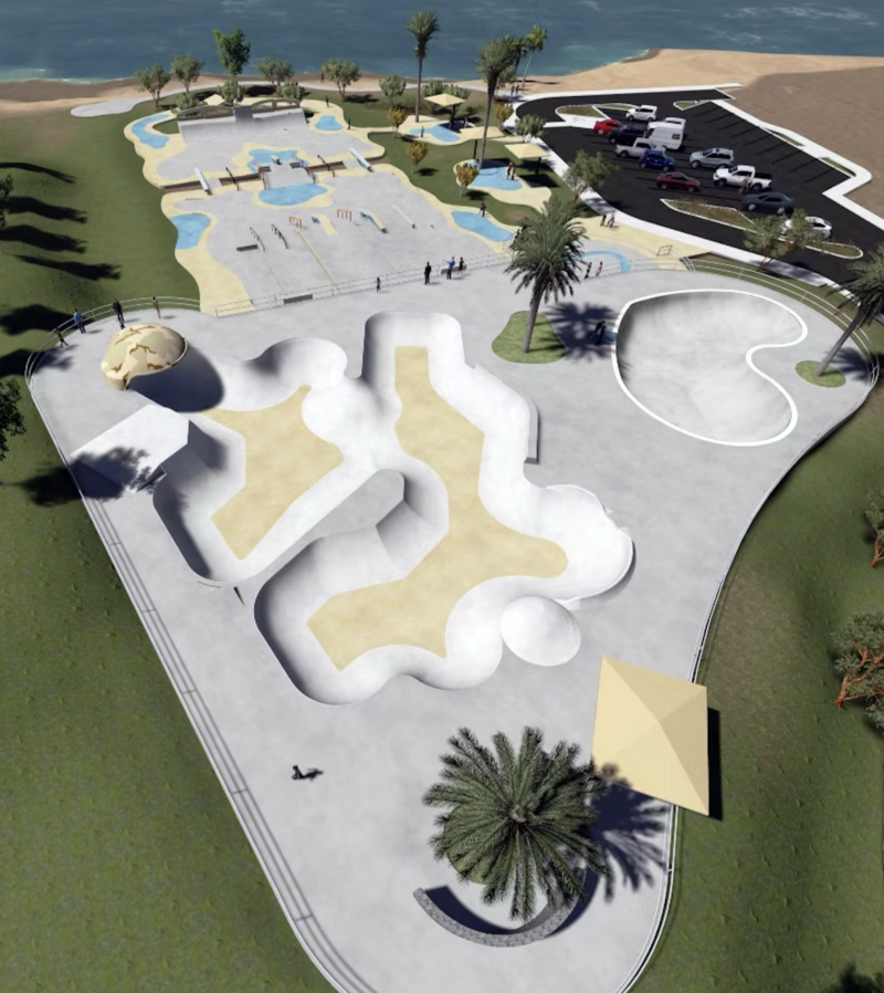 Professional skatepark built with symmetrical layout, ledges, stairs, and rails
