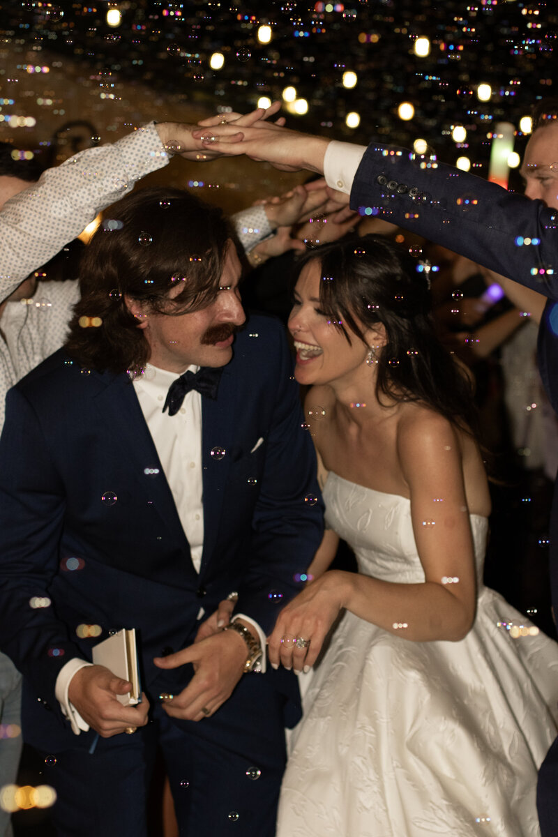 Candid wedding exit photo