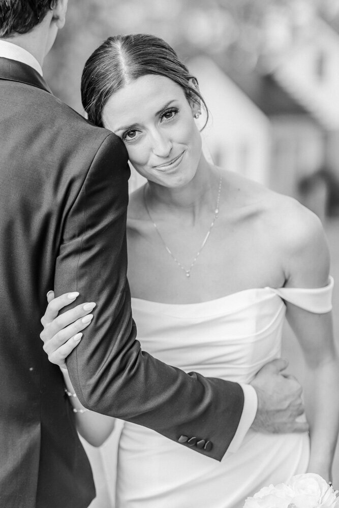 Luxury Wedding Photographer Atlanta | Bride Smiling While Leaning On The Groom