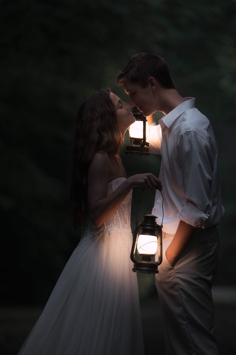 Elopement couple using lanterns to guide their love.