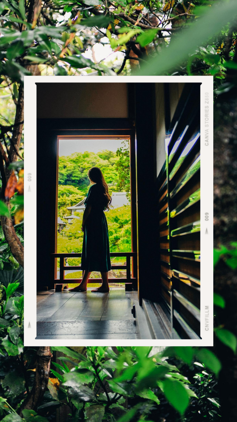kacy beck standing in temple doorway in kamakura japan