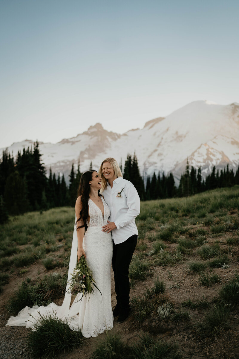 LGBTQ couple smiling after their adventure elopement at Mt. Rainier