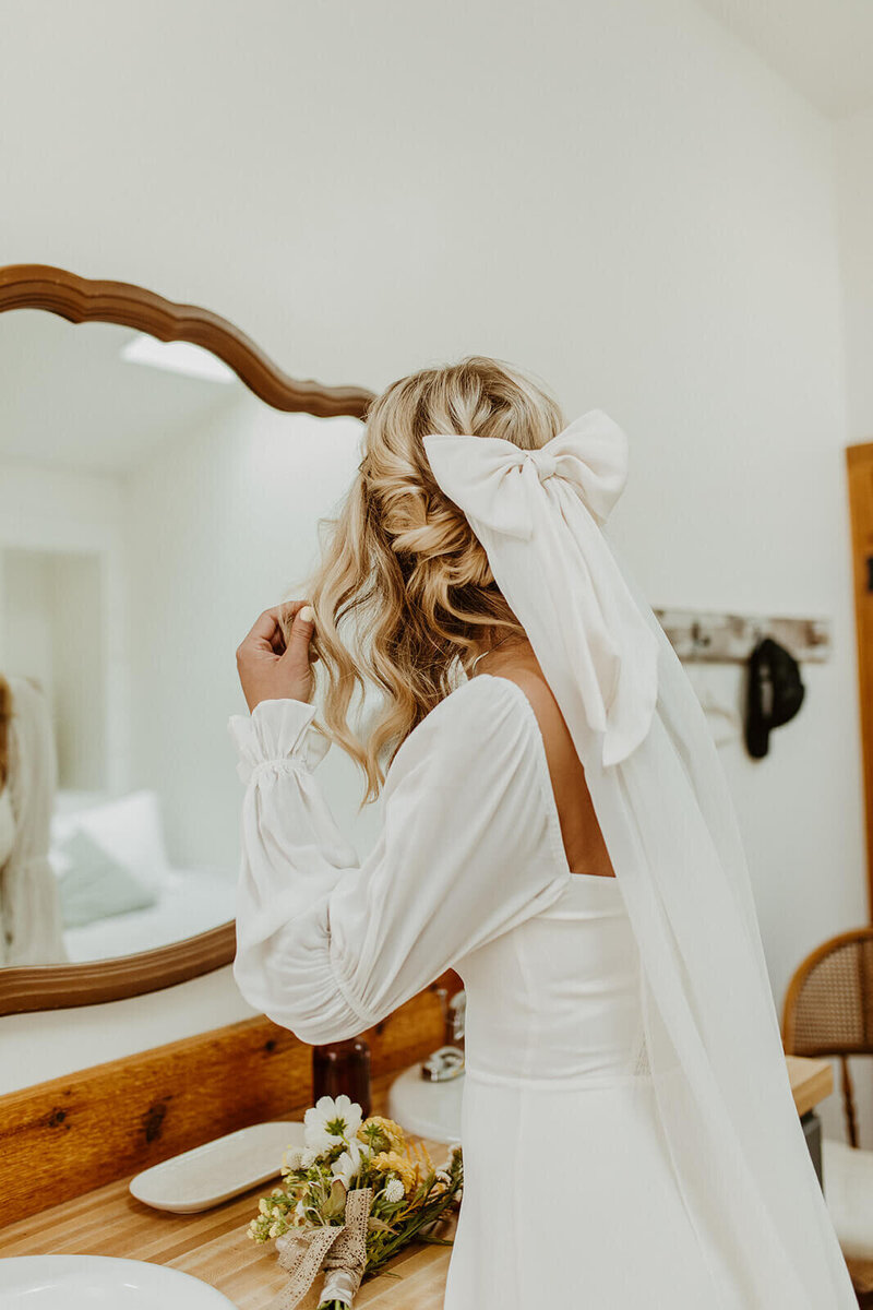 A bride getting ready for her wedding, representing the event planning services for Perfect Thirds & Co.