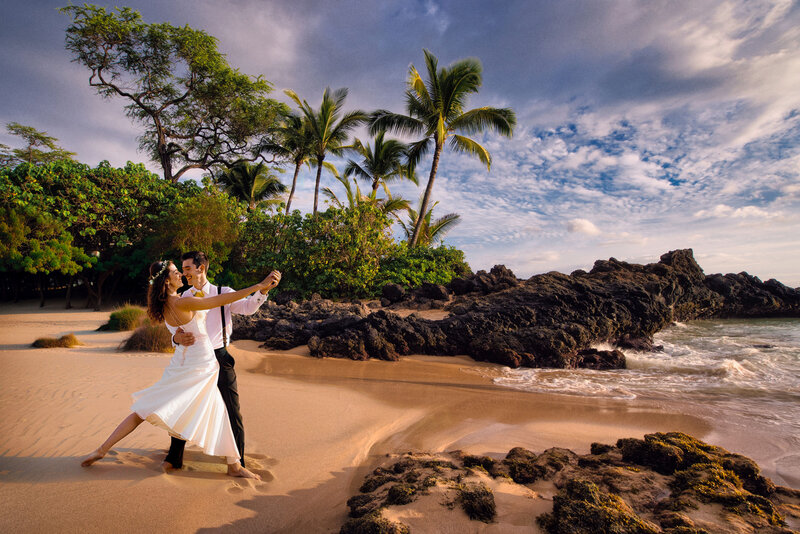 Hawaii destination wedding couple dancing on the beach