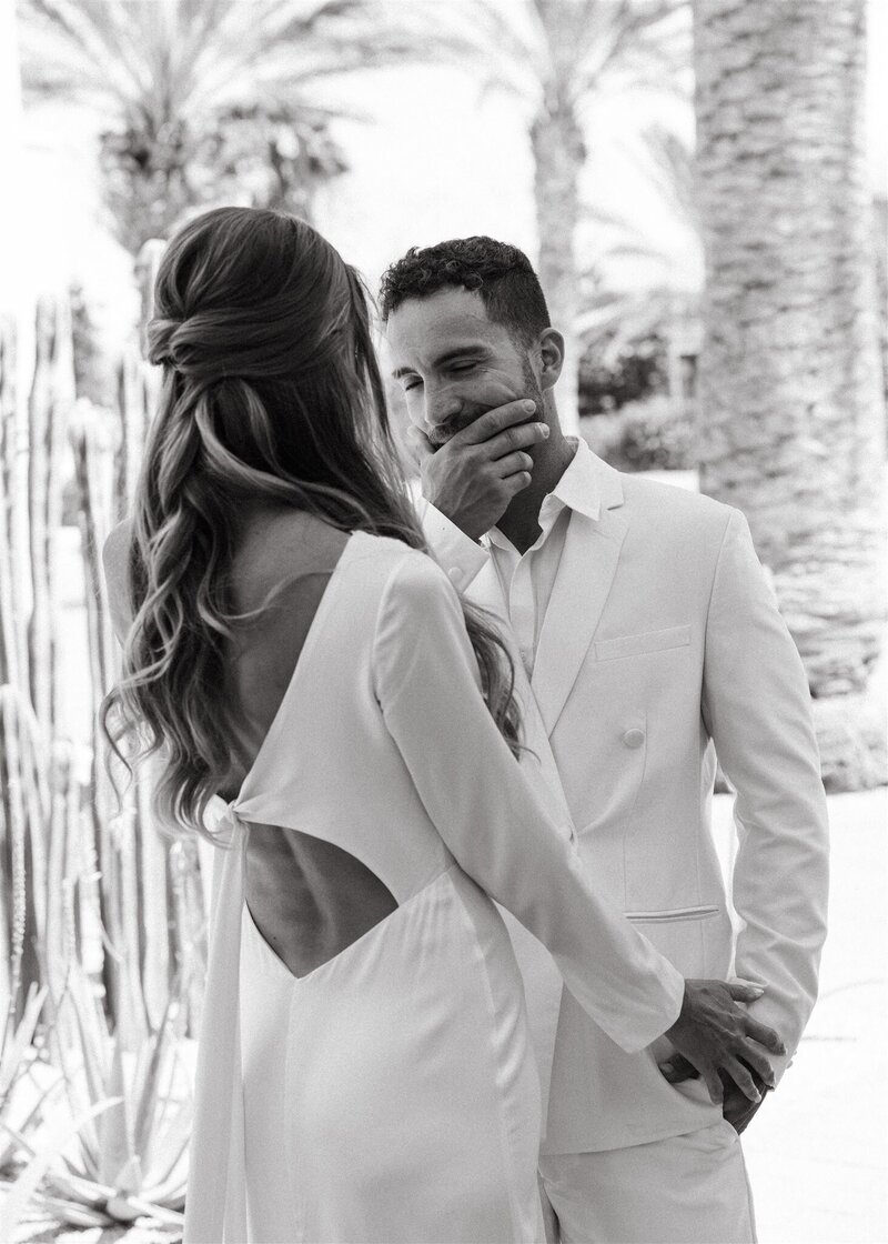 Bride and groom have an emotional first look moment at the Hotel San Cristobal in Todos Santos