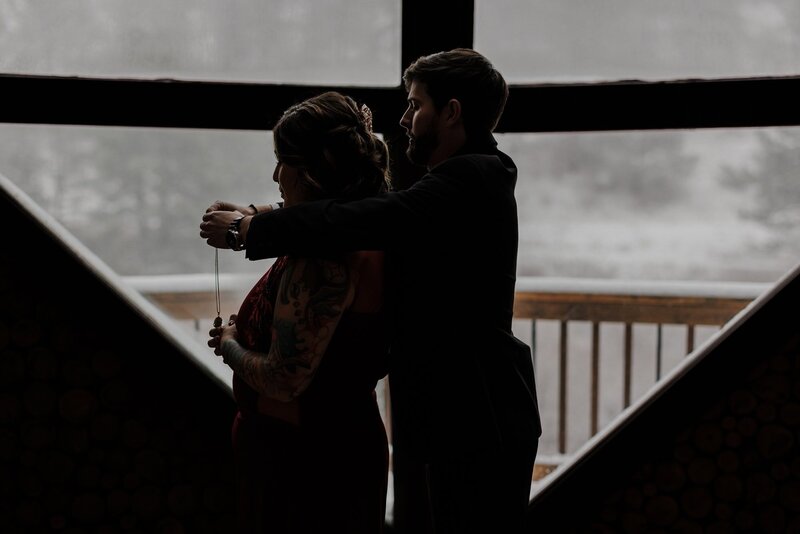 bride and groom get ready together during colorado elopement at rocky mountain national park