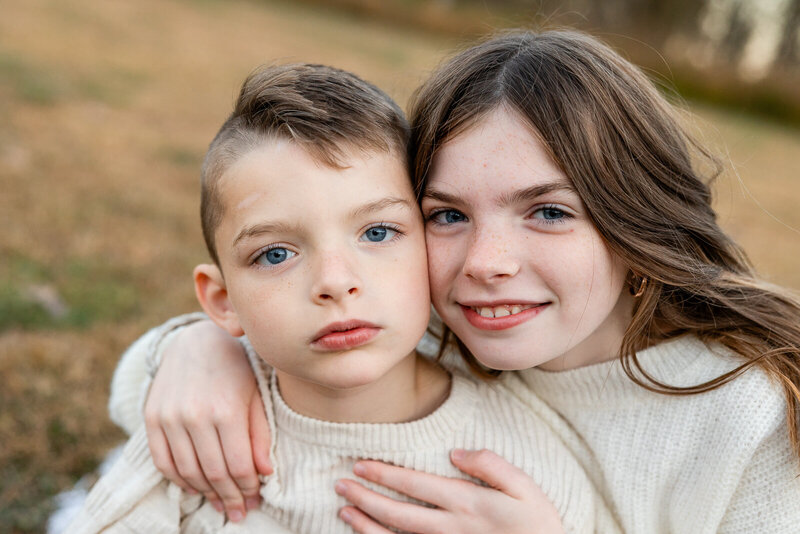 Close up portrait of a brother and sister during a lifestyle portrait session. 