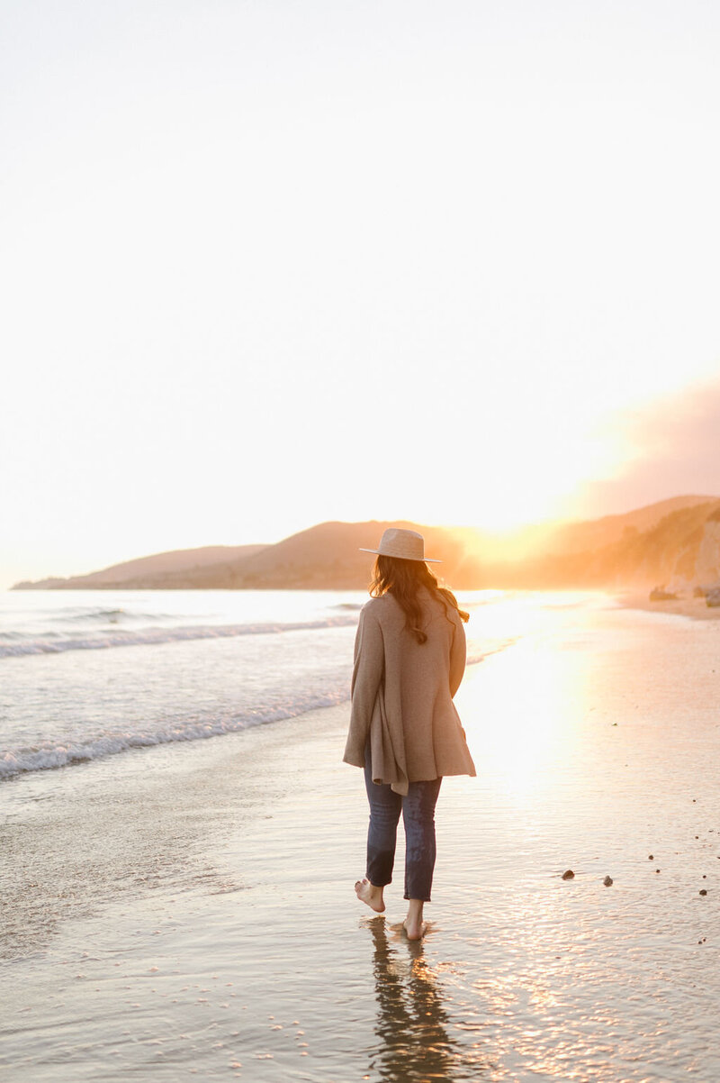 Allie Marie Smith, walking on the beach at sunset
