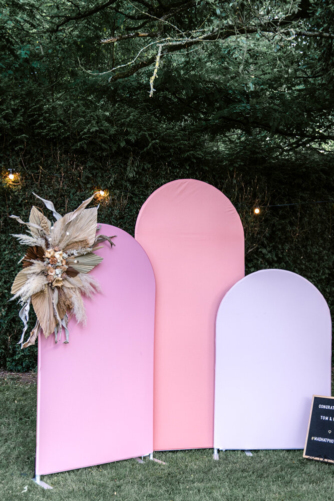 modern arches with coral pinks hues perfect for wedding backdrops or corporate events