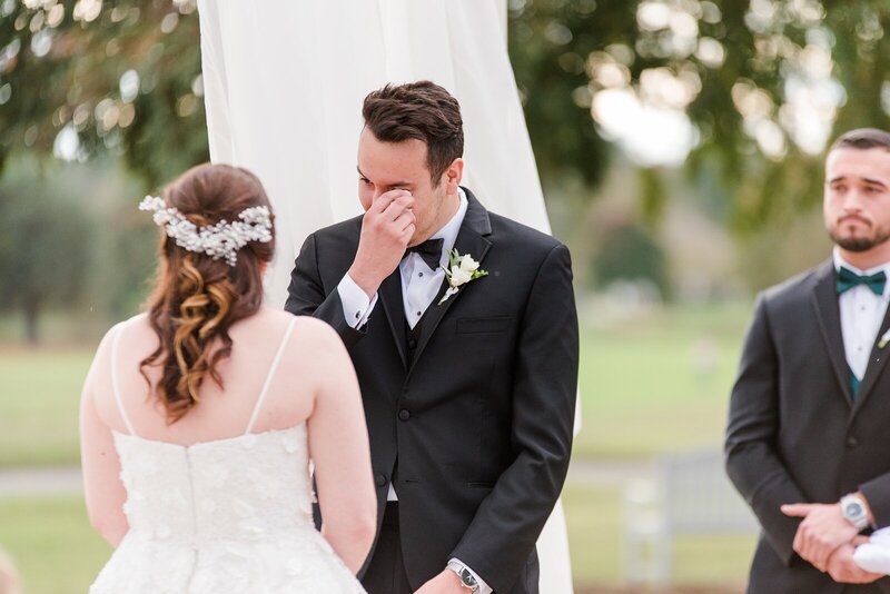 Groom wiping tears during Richmond Wedding ceremony