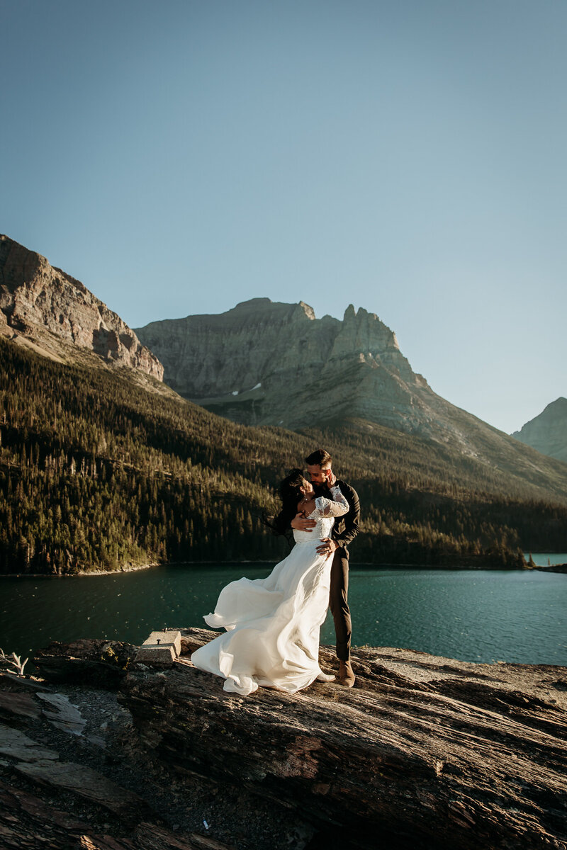 Couple during adventure elopement in front of mountainside