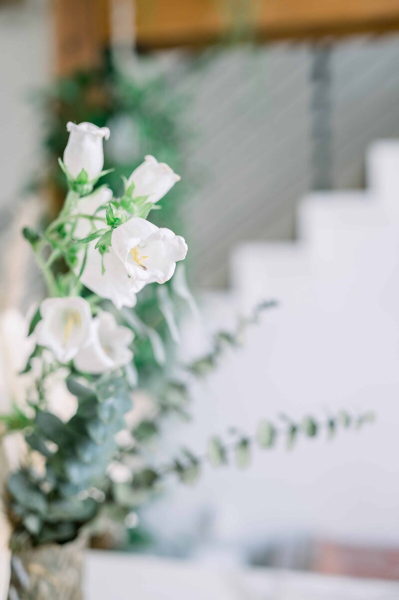 Beautiful bouquet of white roses sitting on a table