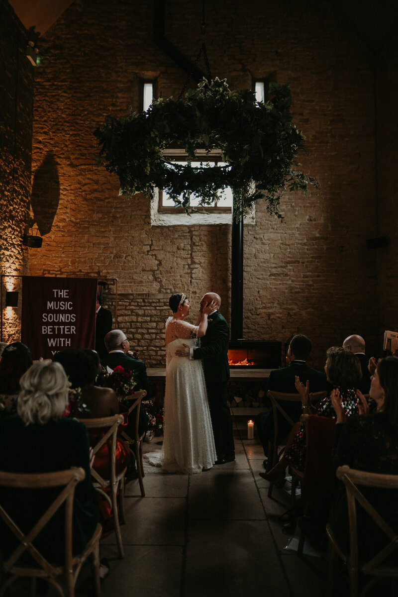 Couple share their first kiss at The Old Gore in The Cotswolds. 