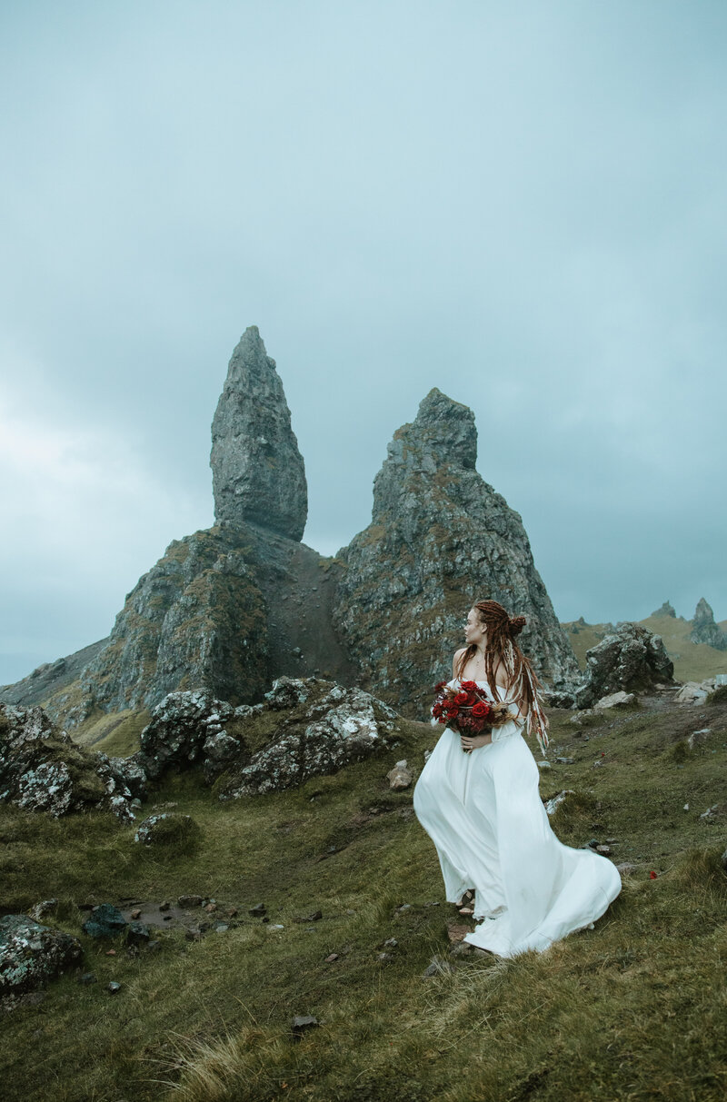 Emotional rainy Scotland elopement ceremony in a lush Highland valley