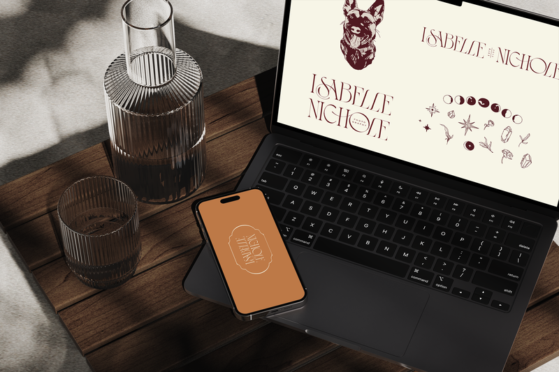 Laptop and phone on table