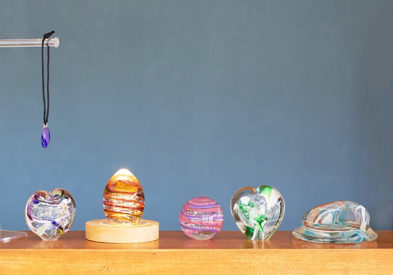 Blown glass memorial keepsakes infused with pet remains, offered by Nature's Way Pet Aquamation, providing a unique and heartfelt way to honor your beloved pet.