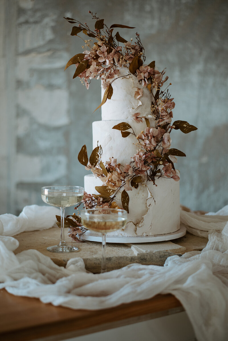 concrete and sugar flower wedding cake