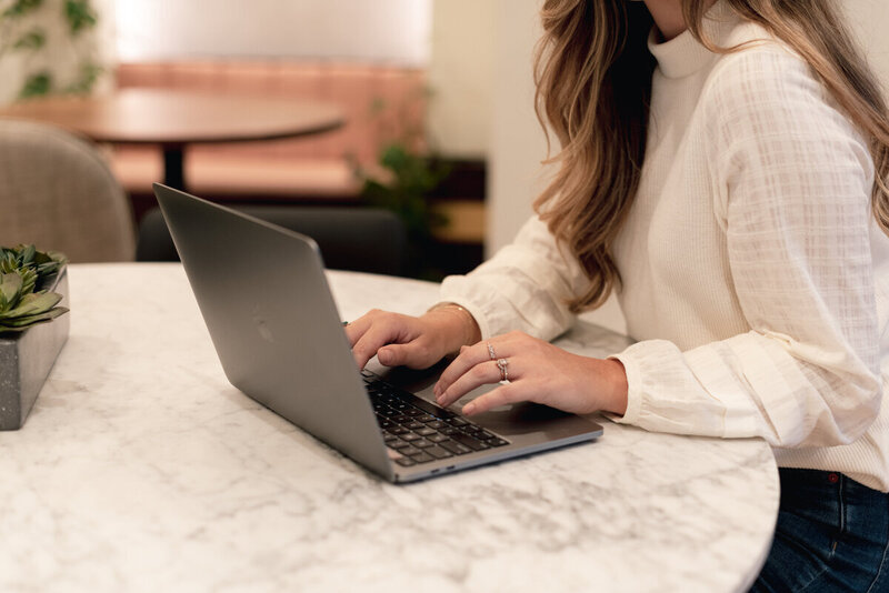CBT in Raleigh NC featuring woman typing at table