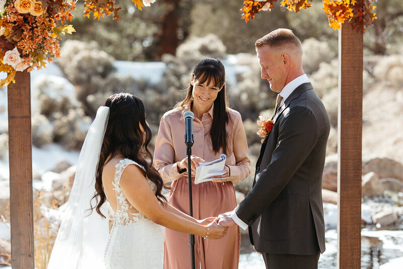 Coordinator officiating a wedding at Cienaga Creek Ranch