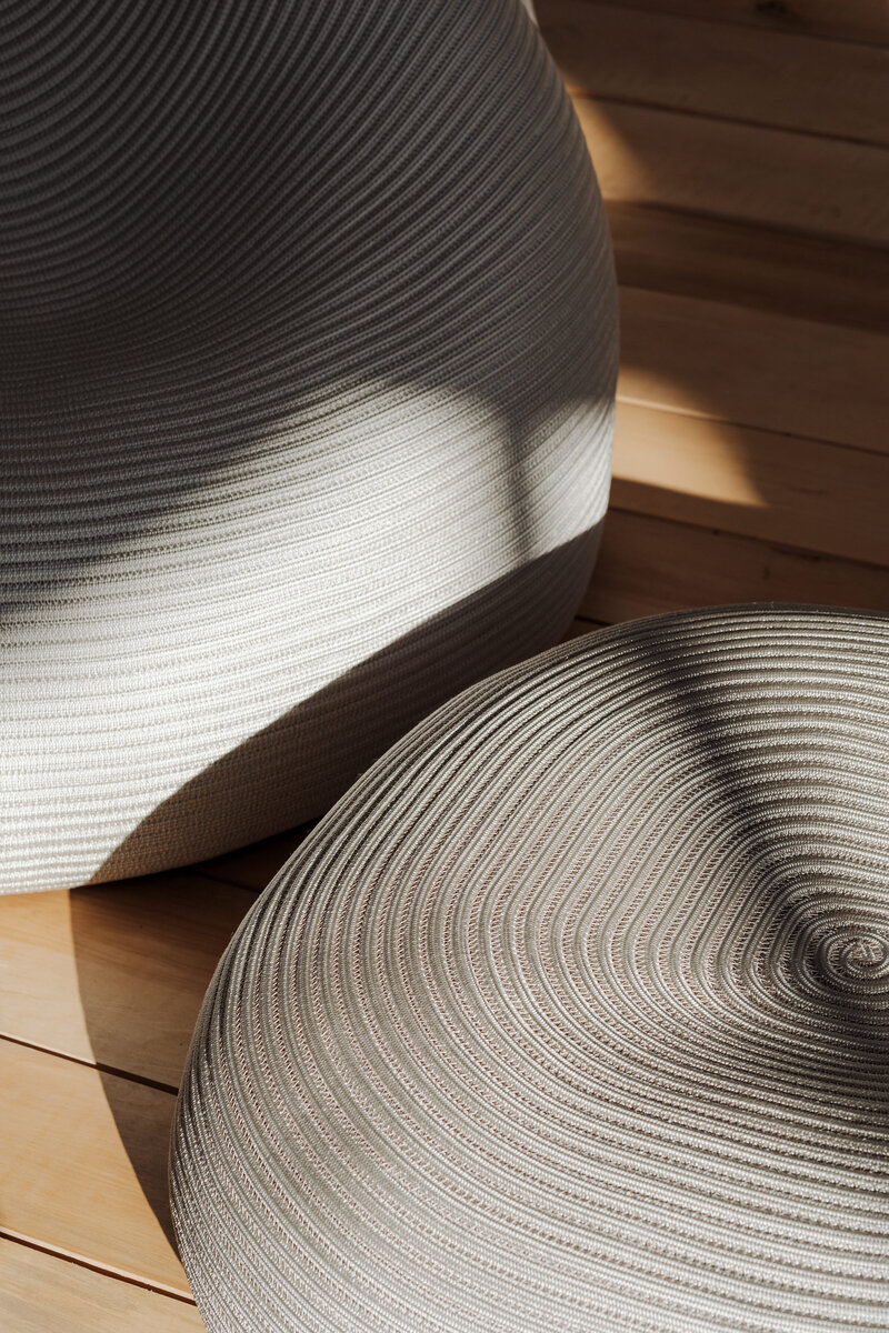 kaboompics_softly-lit-patterned-poufs-on-wooden-floor-37002