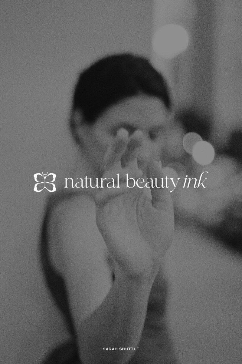 Logo variation over black and white photo of elegant woman for Natural Beauty Ink brand.
