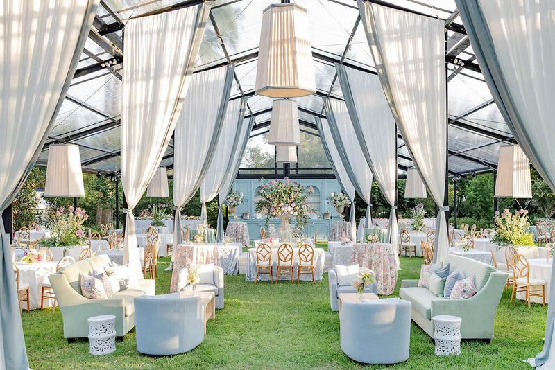 Luxury Wedding Reception at Residential Property with clear top tent and acrylic dance floor over the pool