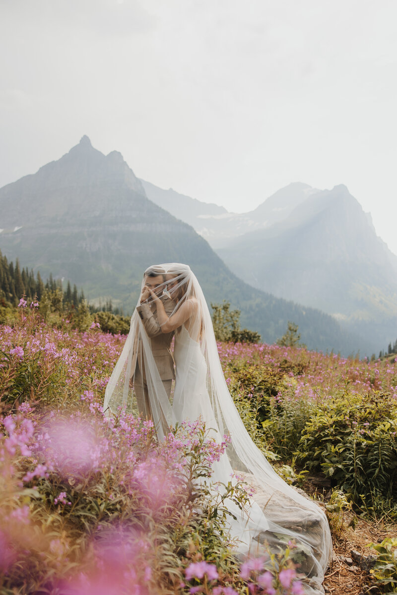 Bride and Groom in Glacier with purple fireweed