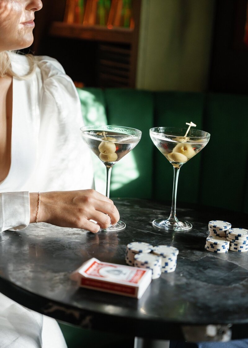 Woman sitting with martinis taken for engagement photography florida by Shelby Ann Photos