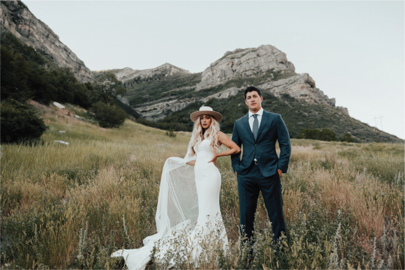 bride-and-groom-in-front-of-mountains