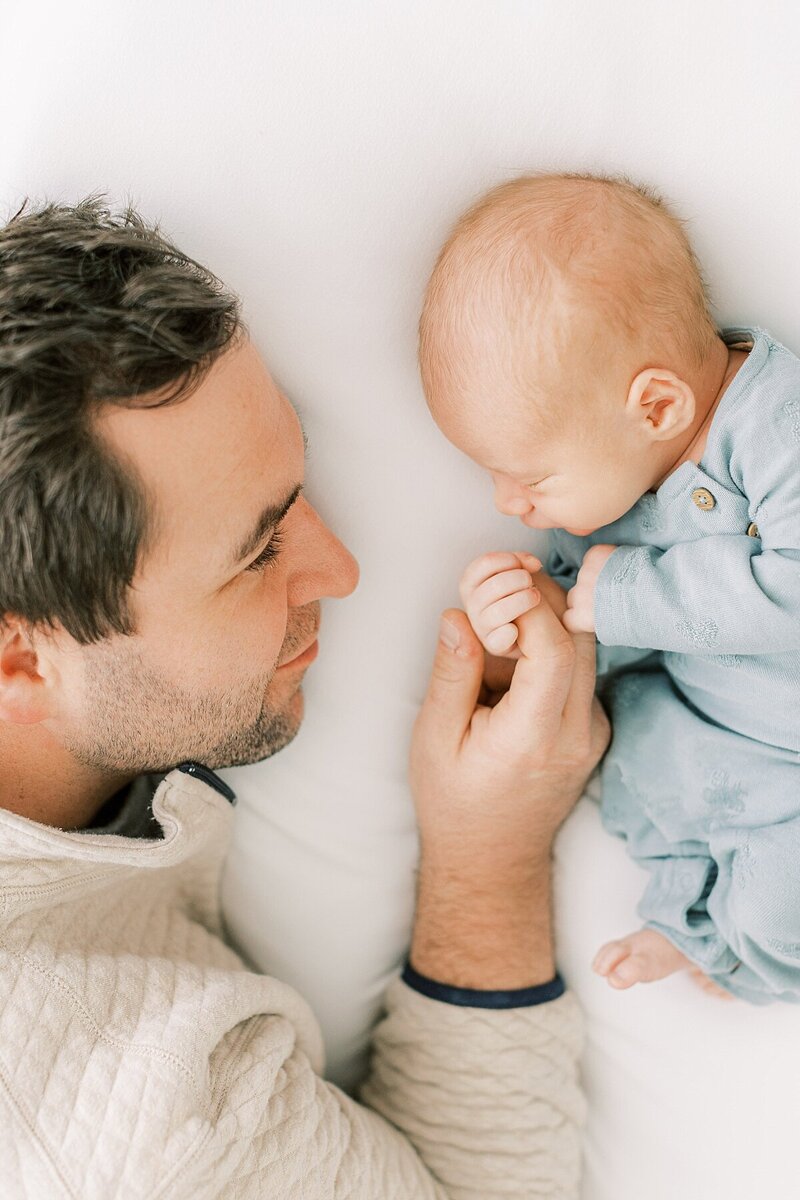 baby in blue newborn session in Lancaster, serving Harrisburg, Hershey