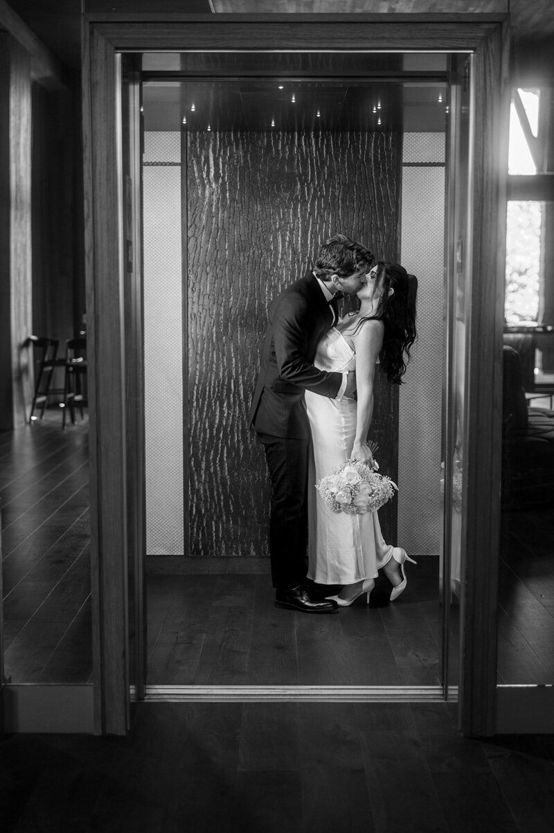 A person kneeling down and proposing to their partner 