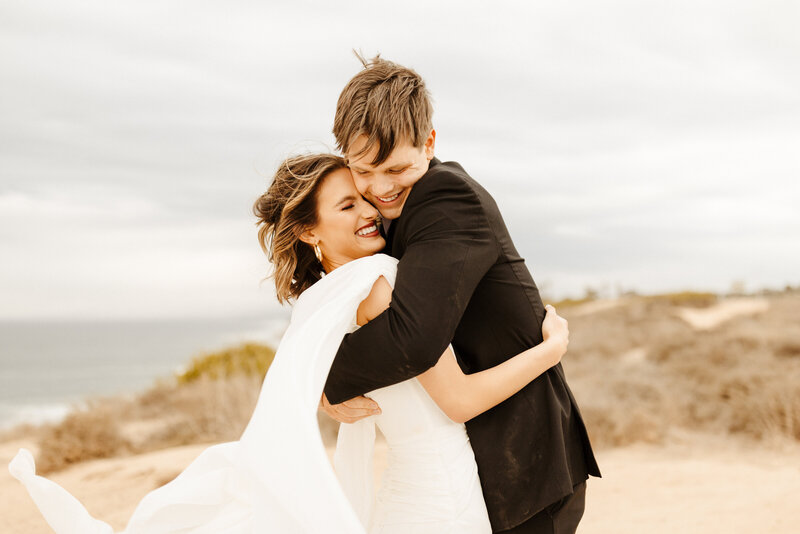 bride and groom at Southern California cliffside wedding