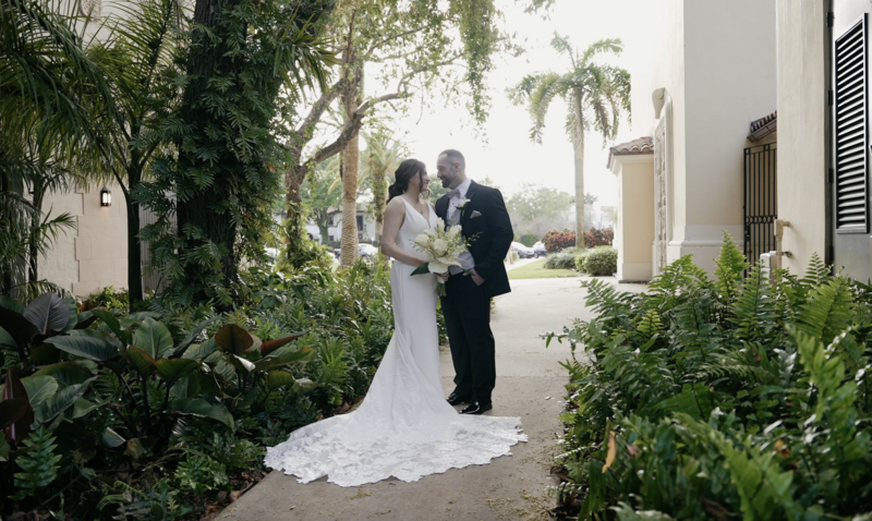 groom and bride embracing