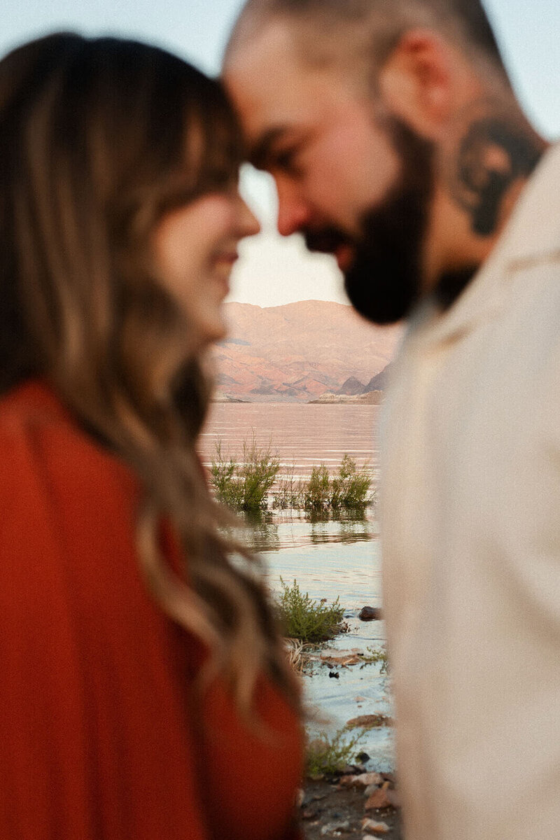Blury-photo-of-husband-and-wife-near-the-lake