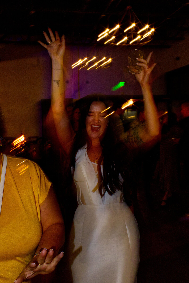 Woman dancing at wedding