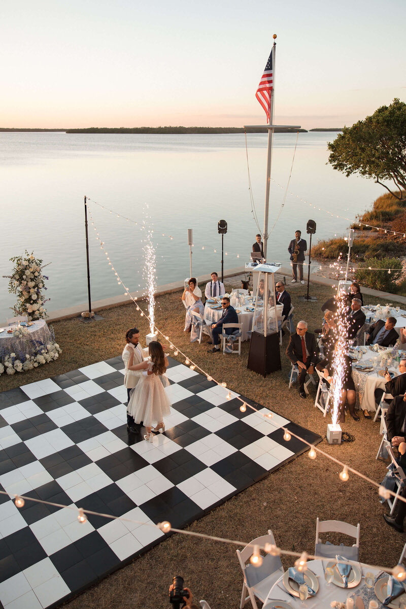 overhead view of checkered dance floor and reception by wedding planner tampa