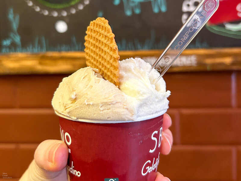 Cup of natural gelato with a waffle cookie at Sbrino Gelatifcio Contadino in Florence, Italy