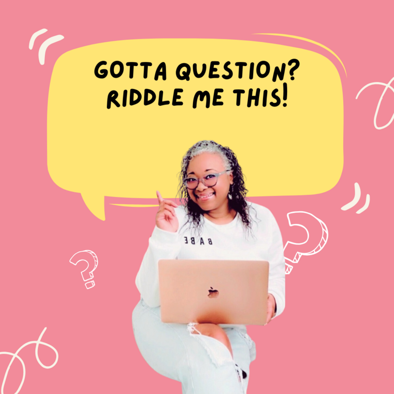 Letitia Hopkins smiling while sitting with her laptop on her lap, pointing up to the question "Gotta question? Riddle me this!" inviting women to submit coaching questions as part of her life, love, and relationship coaching work rooted in self-love, confidence, and Main Character Energy.
