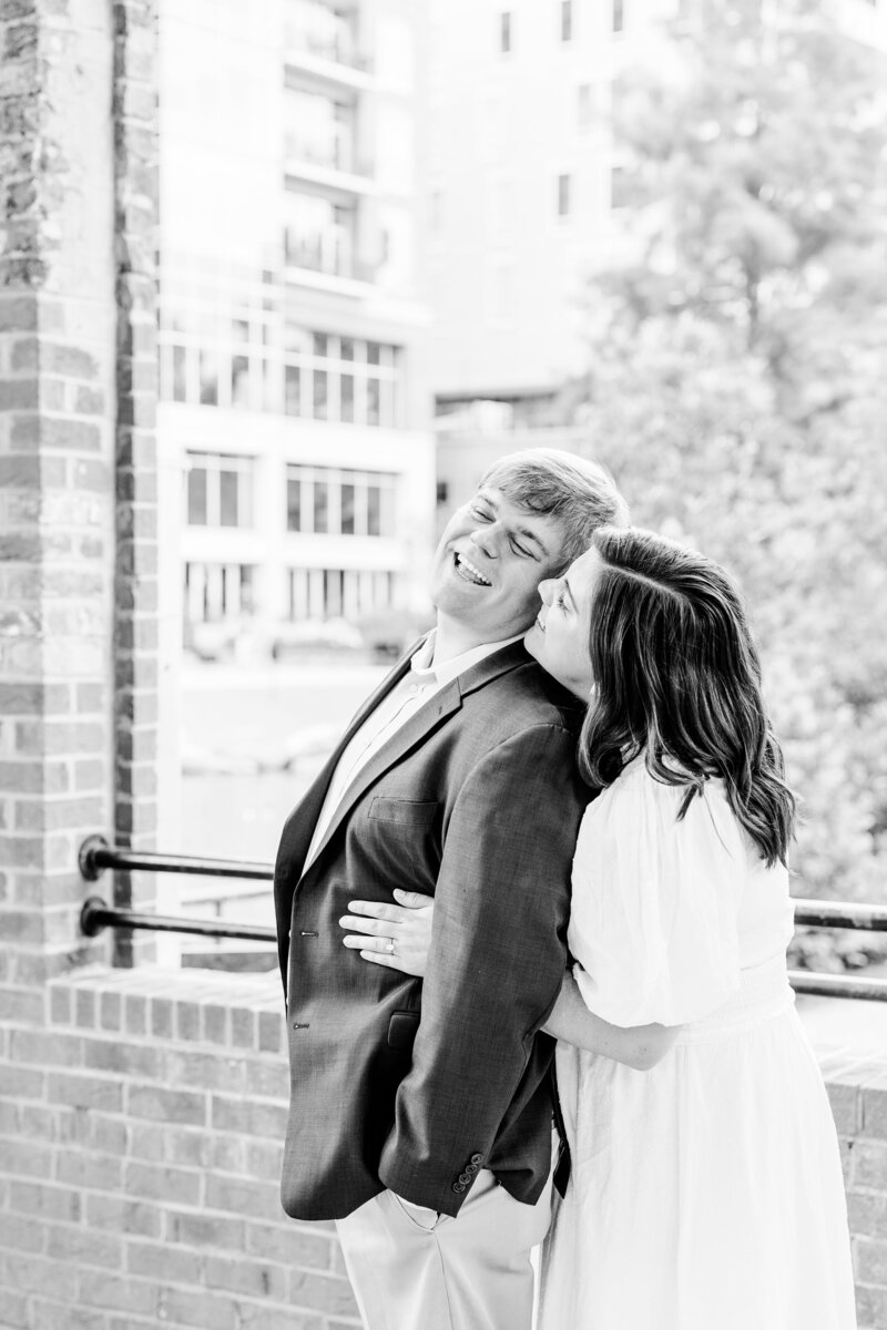 couple laughing at Wyche pavilion engagement session