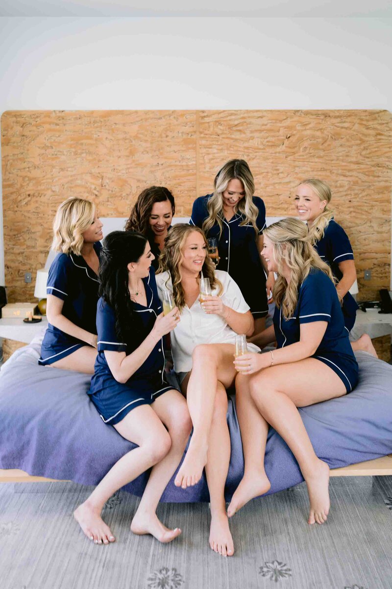bride with bridesmaids in morning